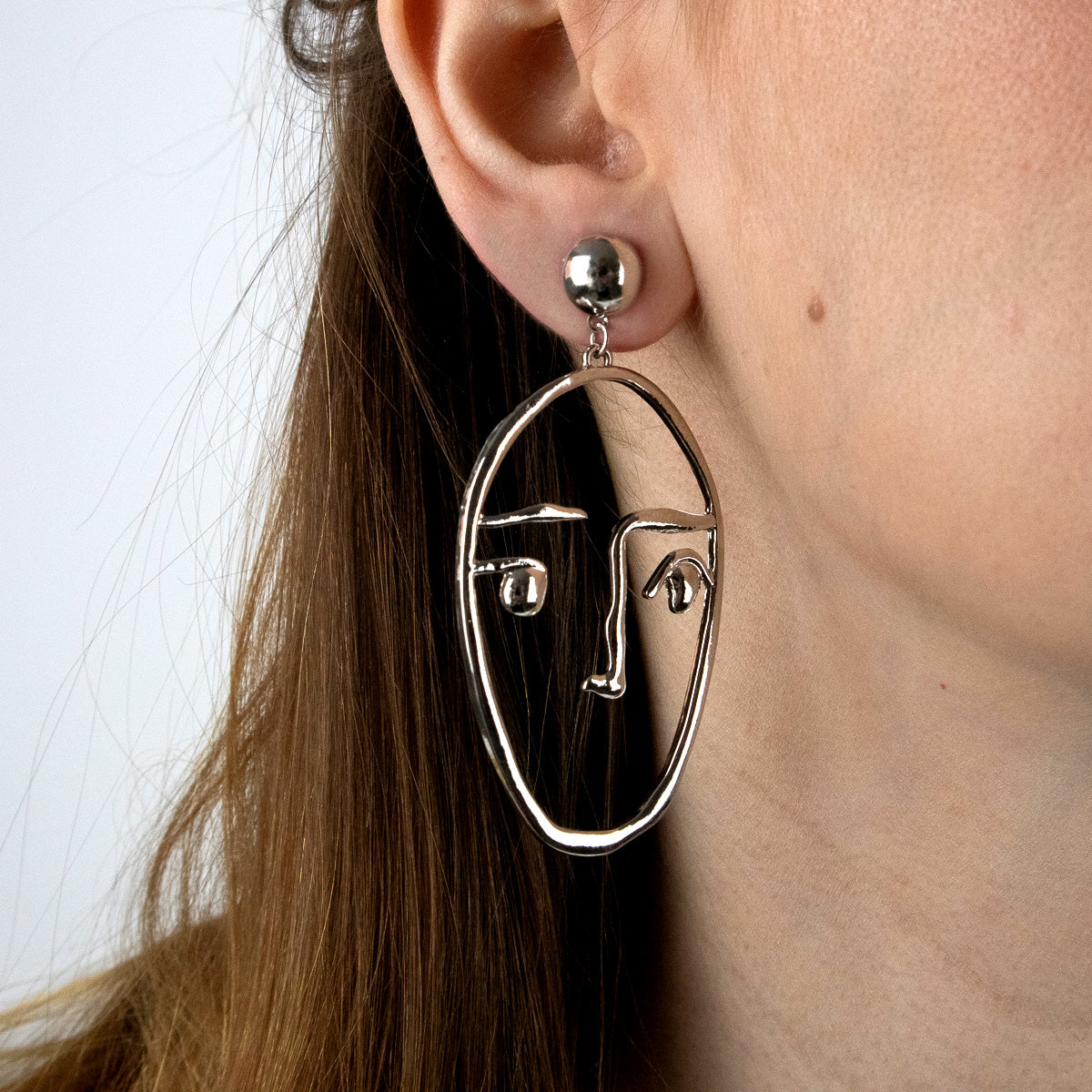 Abstract Face silver earrings