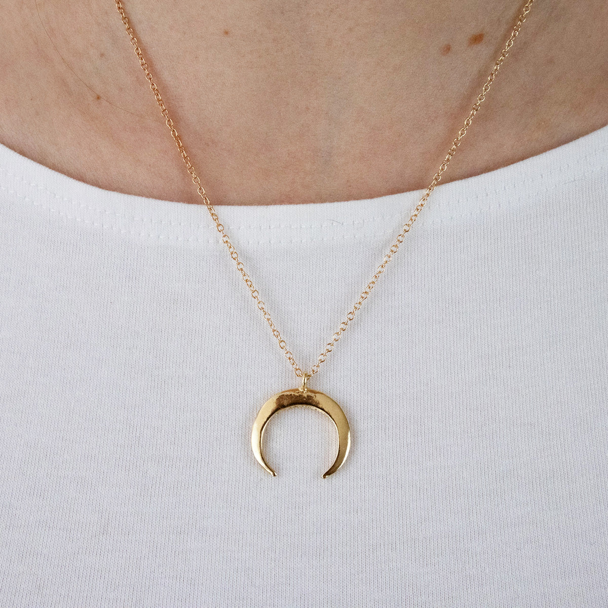 Half moon gold necklace