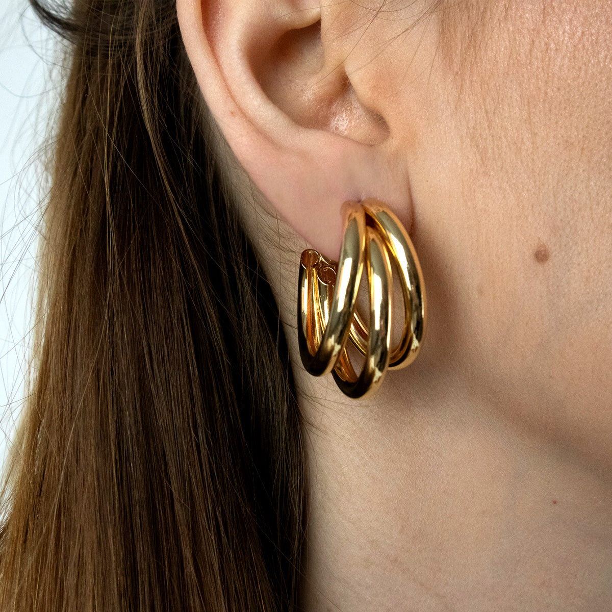 Triple gold hoop earrings